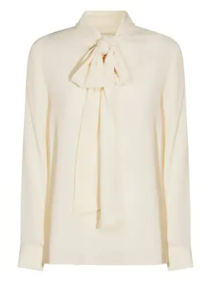 Блузка с бантом на шее и длинными рукавами