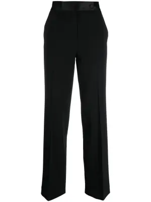 Брюки асимметричного кроя на пуговицах