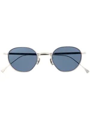 Солнцезащитные очки в круглой оправе