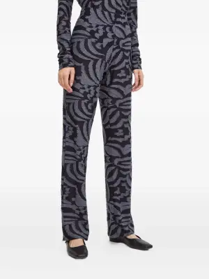 Брюки с бахромой