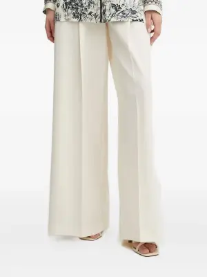 Плиссированные брюки прямого кроя