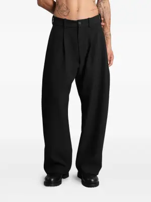 Брюки с плиссированными карманами