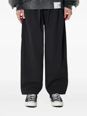 брюки с карманами на молнии