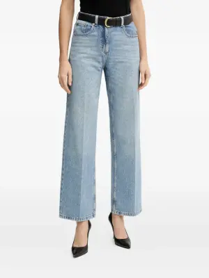 Джинсы с пуговицами