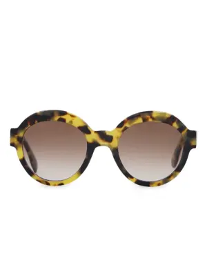 Солнцезащитные очки в круглой оправе