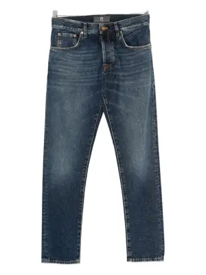 Джинсы с эффектом потертости