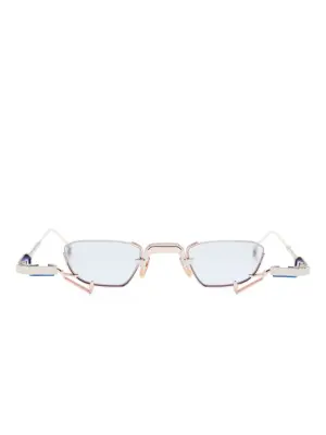 Солнцезащитные очки в геометричной оправе