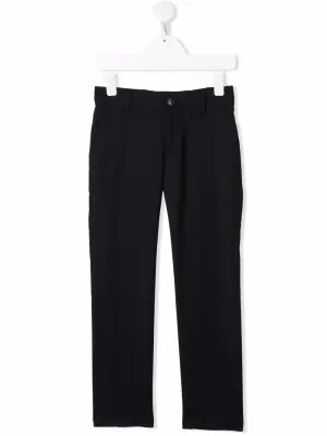 Строгие брюки кроя слим