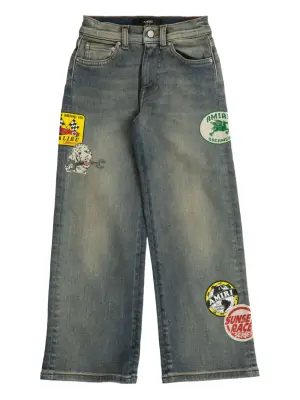 Широкие джинсы с нашивками