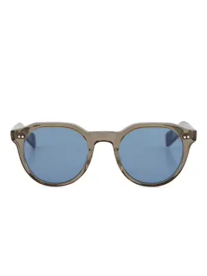 Солнцезащитные очки в круглой оправе