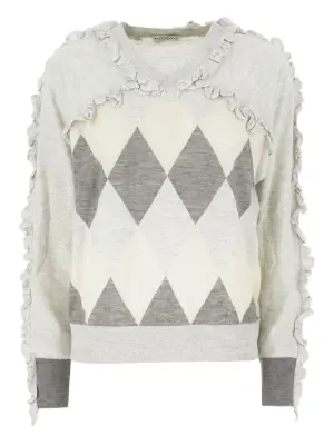 Свитер с оборками и узором