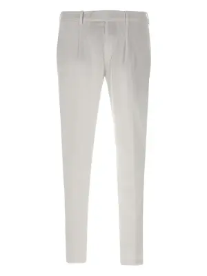 брюки строгого кроя со складками