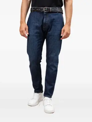 Джинсы с эффектом потертости