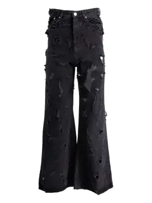 Джинсы с эффектом потертости