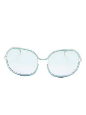 Солнцезащитные очки в круглой оправе