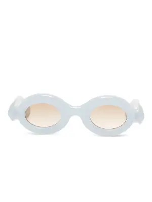 солнцезащитные очки в овальной оправе